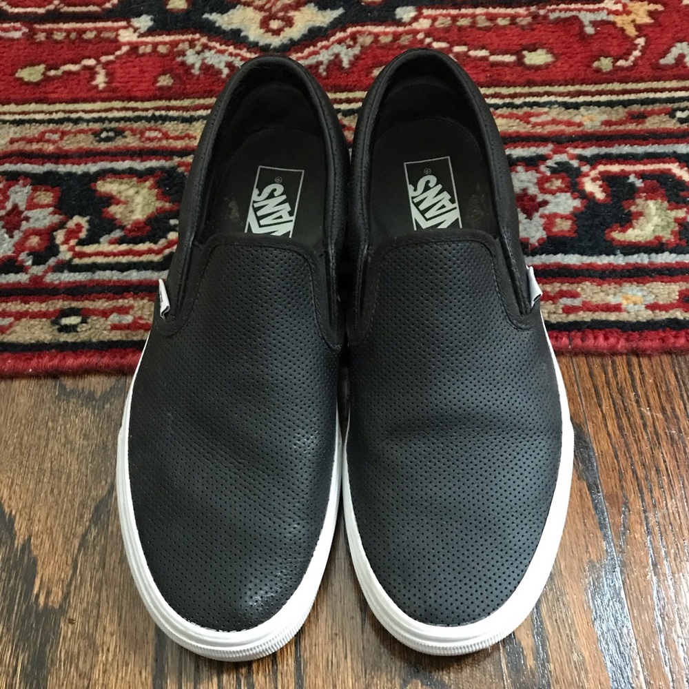 vans slip-ons in perforated black